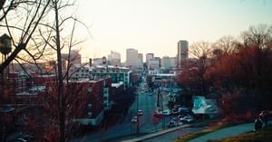 City scape around sunset from the top of a park