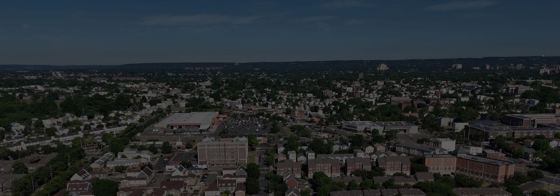 City skyline with black overlay