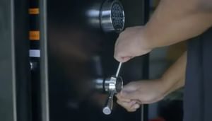 Male hands unlocking a gun safe