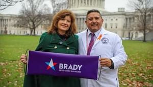 Brady CEO Kris Brown and Dr Roy Guerrero Uvalde pediatrician hold a Brady sign